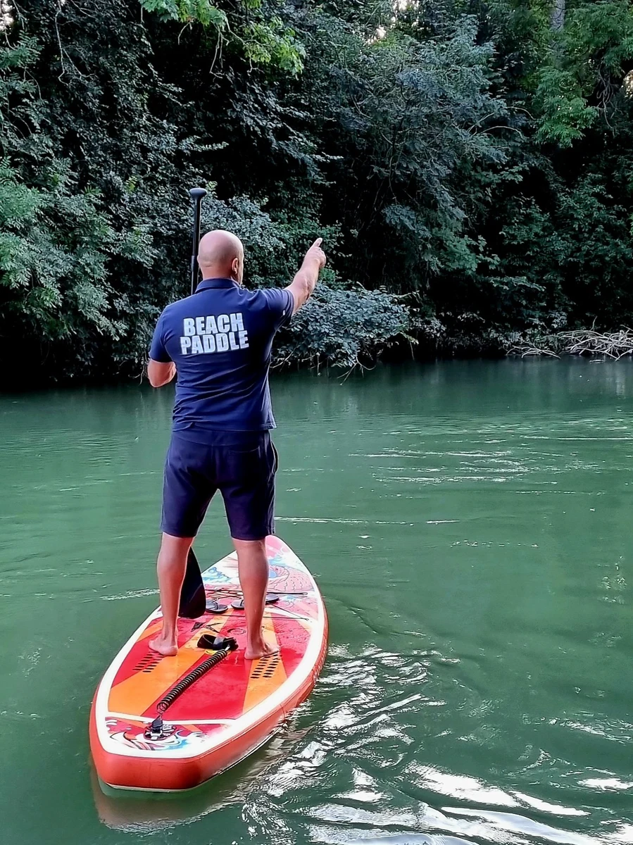 Moniteur stand up paddle sur la Marne en milieu naturel